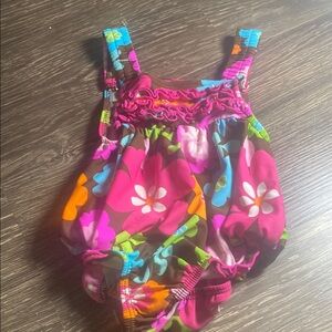 Carter brand 18 month girls one piece floral ruffle swimsuit.   Adorable.   New